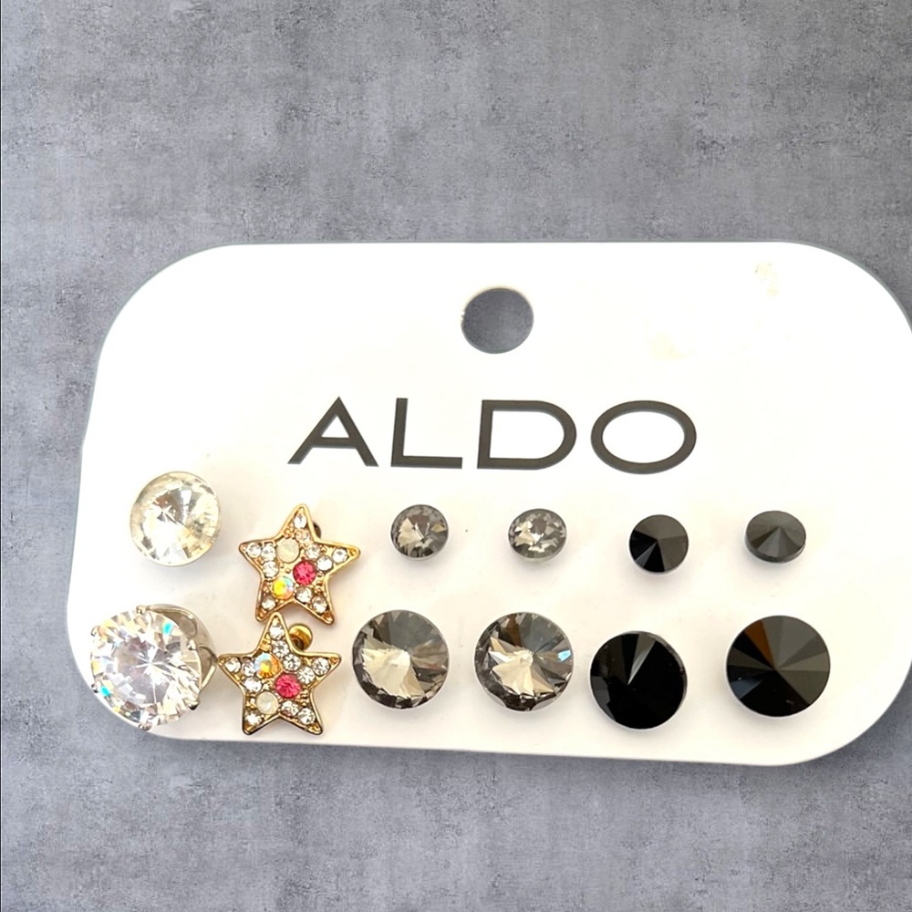 Six pairs of earrings by Aldo, NWT